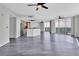 Spacious living room featuring water views, stylish flooring and modern lighting at 231 Riverside Dr # 1801-1, Daytona Beach, FL 32117