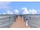 Scenic view of the pier extending into the water with a beautiful cityscape in the distance at 231 Riverside Dr # 1801-1, Daytona Beach, FL 32117