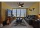 Comfortable living room features beautiful ocean views and a ceiling fan at 2800 N Atlantic Ave # 116, Daytona Beach, FL 32118