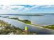 Waterfront home boasts scenic views of the surrounding waterway with mature trees at 2852 John Anderson Dr, Ormond Beach, FL 32176