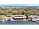 Waterfront property with lush lawn, dock, and scenic water views at 2852 John Anderson Dr, Ormond Beach, FL 32176