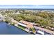 Aerial view of stunning waterfront property with well-maintained lawn and canal access at 2852 John Anderson Dr, Ormond Beach, FL 32176