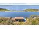 Waterfront home with swimming pool boasts scenic views of the surrounding waterway at 2852 John Anderson Dr, Ormond Beach, FL 32176