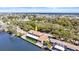 Aerial view of stunning waterfront property with well-maintained lawn and canal access at 2852 John Anderson Dr, Ormond Beach, FL 32176