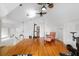 Bright bonus room with hardwood floors, vaulted ceiling, and ceiling fans at 2852 John Anderson Dr, Ormond Beach, FL 32176