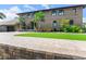 Beautiful brick home with manicured lawn, stone accents, and ample parking space at 2852 John Anderson Dr, Ormond Beach, FL 32176