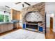 Bright kitchen featuring stainless steel appliances and a brick archway over the stove at 2852 John Anderson Dr, Ormond Beach, FL 32176