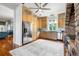 Modern kitchen with stainless steel appliances, wooden cabinets, and hardwood flooring at 2852 John Anderson Dr, Ormond Beach, FL 32176