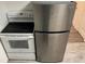 Image showcasing an oven and a stainless steel top-freezer refrigerator at 333 8Th St, Daytona Beach, FL 32117