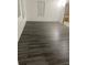 Picture of the cozy living area with neutral walls and laminate flooring at 333 8Th St, Daytona Beach, FL 32117