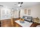 Cozy living room with hardwood floors and modern decor; perfect for relaxation and entertaining at 3346 Pegaso Ave, New Smyrna Beach, FL 32168