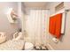 Clean bathroom with granite vanity, shower-tub combo, and warm accents at 339 Spruce Pine Dr, Debary, FL 32713