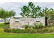 Beautiful Springview Woods community sign with mature trees and landscaping at 339 Spruce Pine Dr, Debary, FL 32713
