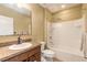 Well-lit bathroom features a shower-over-tub with neutral tones and a granite countertop vanity at 347 Admiralty Ct, Edgewater, FL 32141