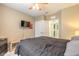 Bedroom with neutral walls, ceiling fan and a comfortable bed at 347 Admiralty Ct, Edgewater, FL 32141