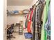 Walk-in closet featuring ample shelving and hanging space for clothing and accessories at 347 Admiralty Ct, Edgewater, FL 32141