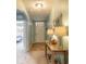 Inviting hallway with decorative elements, leading to other parts of the home at 347 Admiralty Ct, Edgewater, FL 32141