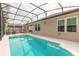 Screened in pool area with seating, a few windows, and lots of natural light at 347 Admiralty Ct, Edgewater, FL 32141