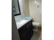 Bathroom featuring a dark vanity with chrome pulls, a white toilet, and wood-style flooring at 3960 Willow Trail Run # 45, Port Orange, FL 32127