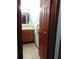 Bathroom vanity with wooden cabinets and a view of the room at 3960 Willow Trail Run # 45, Port Orange, FL 32127
