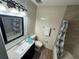 Well-lit bathroom featuring a vanity, toilet, and tiled shower/tub combination at 3960 Willow Trail Run # 45, Port Orange, FL 32127