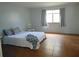 Bedroom featuring neutral walls, tile floors, a queen bed and a window at 3960 Willow Trail Run # 45, Port Orange, FL 32127