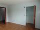 View of bedroom with ceramic tile flooring and a closet with bi-fold doors at 3960 Willow Trail Run # 45, Port Orange, FL 32127