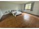 Bedroom with tile flooring, a large window, and ample natural light at 3960 Willow Trail Run # 45, Port Orange, FL 32127