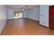 Spacious living room with tile floors and sliding glass doors leading to a private backyard at 3960 Willow Trail Run # 45, Port Orange, FL 32127