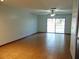 Bright living room features tile flooring and sliding glass doors to the outdoors at 3960 Willow Trail Run # 45, Port Orange, FL 32127