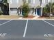 Condo building with assigned parking spaces visible at 3960 Willow Trail Run # 45, Port Orange, FL 32127