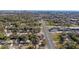 Expansive aerial view of a neighborhood with tree-lined streets, showcasing the proximity to urban areas and waterfronts at 414 Ellsworth St, Daytona Beach, FL 32114