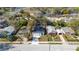 A residential street lined with cozy homes and lush trees, viewed from above at 414 Ellsworth St, Daytona Beach, FL 32114