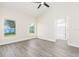 Inviting bedroom with two large windows and an ensuite bathroom for added convenience at 414 Ellsworth St, Daytona Beach, FL 32114
