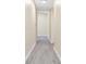 Bright hallway with modern vinyl flooring and neutral paint at 414 Ellsworth St, Daytona Beach, FL 32114