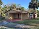 Single story home with a covered parking area, offering convenience at 4605 Hard Rock Cv, Sanford, FL 32773