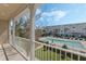 Balcony overlooking community pool at 471 Portico Ct, Oviedo, FL 32765