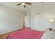 Comfortable bedroom featuring wood floors and a spacious closet with double doors at 471 Portico Ct, Oviedo, FL 32765
