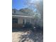 Charming single-story home with a stone accent and mature landscaping at 485 Dickson Ave, Osteen, FL 32764