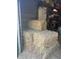 View of bales of hay being stored in a metal shed at 485 Dickson Ave, Osteen, FL 32764