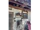 Rustic outbuilding displaying an array of vintage collectibles, including bottles and equestrian gear at 485 Dickson Ave, Osteen, FL 32764