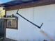 A rustic outbuilding showcasing vintage tools and decorative items, adding character to the property at 485 Dickson Ave, Osteen, FL 32764