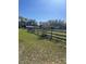 Fenced property with trees at 485 Dickson Ave, Osteen, FL 32764