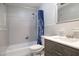 Well-maintained bathroom features tiled walls, shower/tub, and modern vanity for a clean and updated look at 509 Mcintosh Rd, Ormond Beach, FL 32174