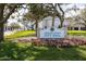 Ormond Beach City Hall sign surrounded by colorful flowers and manicured lawns at 509 Mcintosh Rd, Ormond Beach, FL 32174