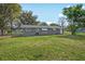 Large backyard that presents many possibilities for relaxation or recreational activities at 512 Power Rd, Sanford, FL 32771