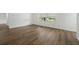 Inviting bedroom featuring neutral walls and new laminate flooring at 512 Power Rd, Sanford, FL 32771