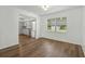 Bright dining room featuring hardwood floors and a view to the backyard at 512 Power Rd, Sanford, FL 32771