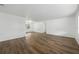 Spacious living room featuring laminate flooring and abundant natural light at 512 Power Rd, Sanford, FL 32771