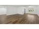 Open living space featuring new laminate flooring, natural light, and great flow at 512 Power Rd, Sanford, FL 32771
